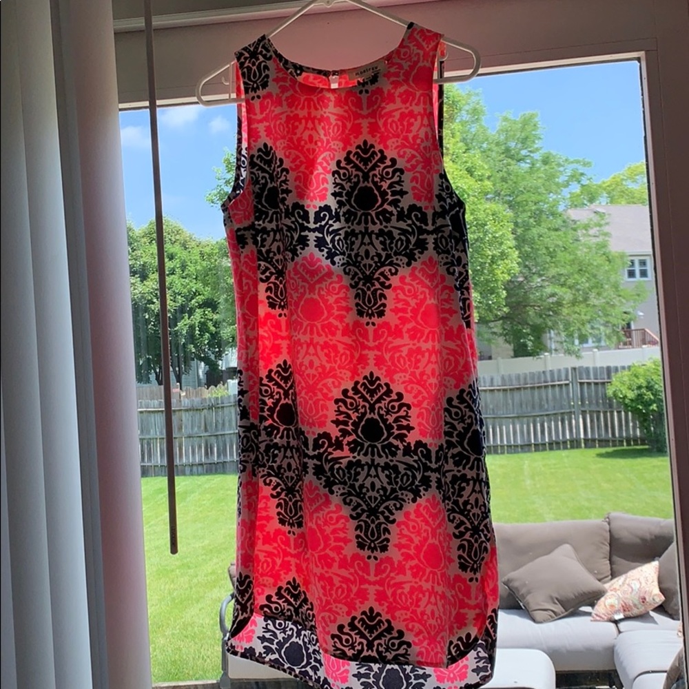 Black pink and white dress.